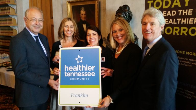 Ken and Tim with sign